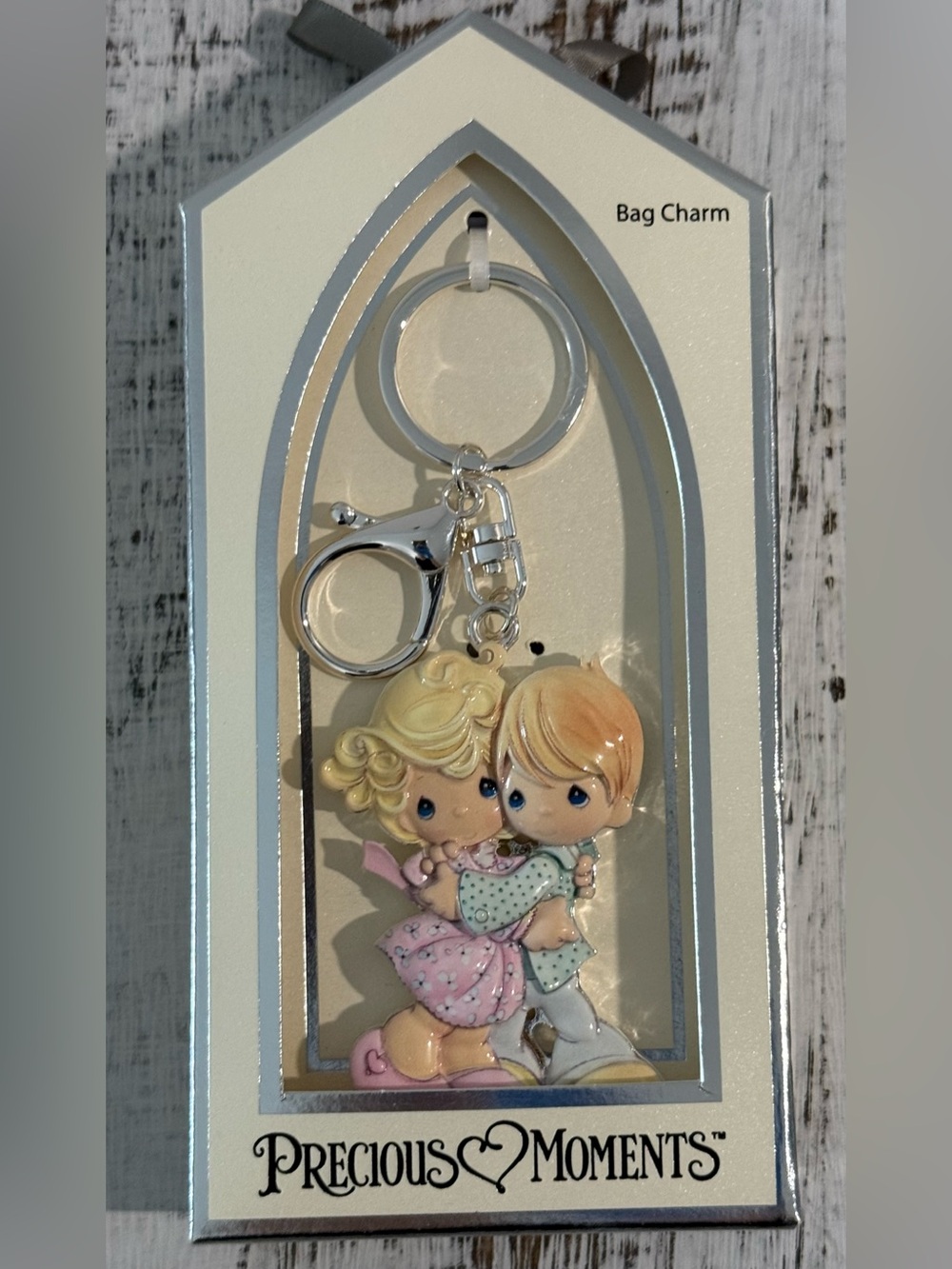 Precious Moments Cream and Pastel Couple Bag Charm New in box.